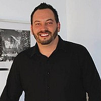 Profile photo for Travis Manney