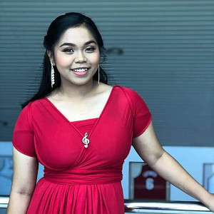 Profile photo for Riza Buenaventura