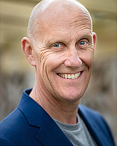 Profile photo for John Newcombe