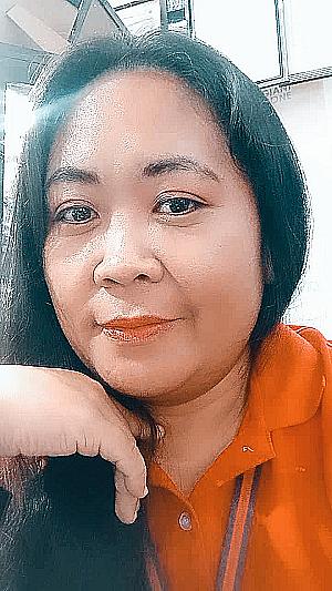 Profile photo for Sheena Sison