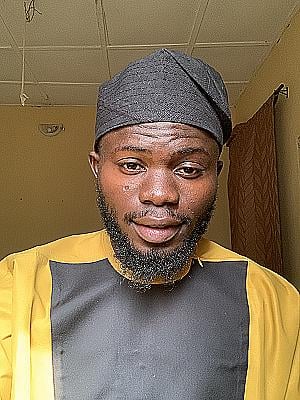 Profile photo for John Ameh