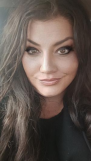 Profile photo for Whitney Rector