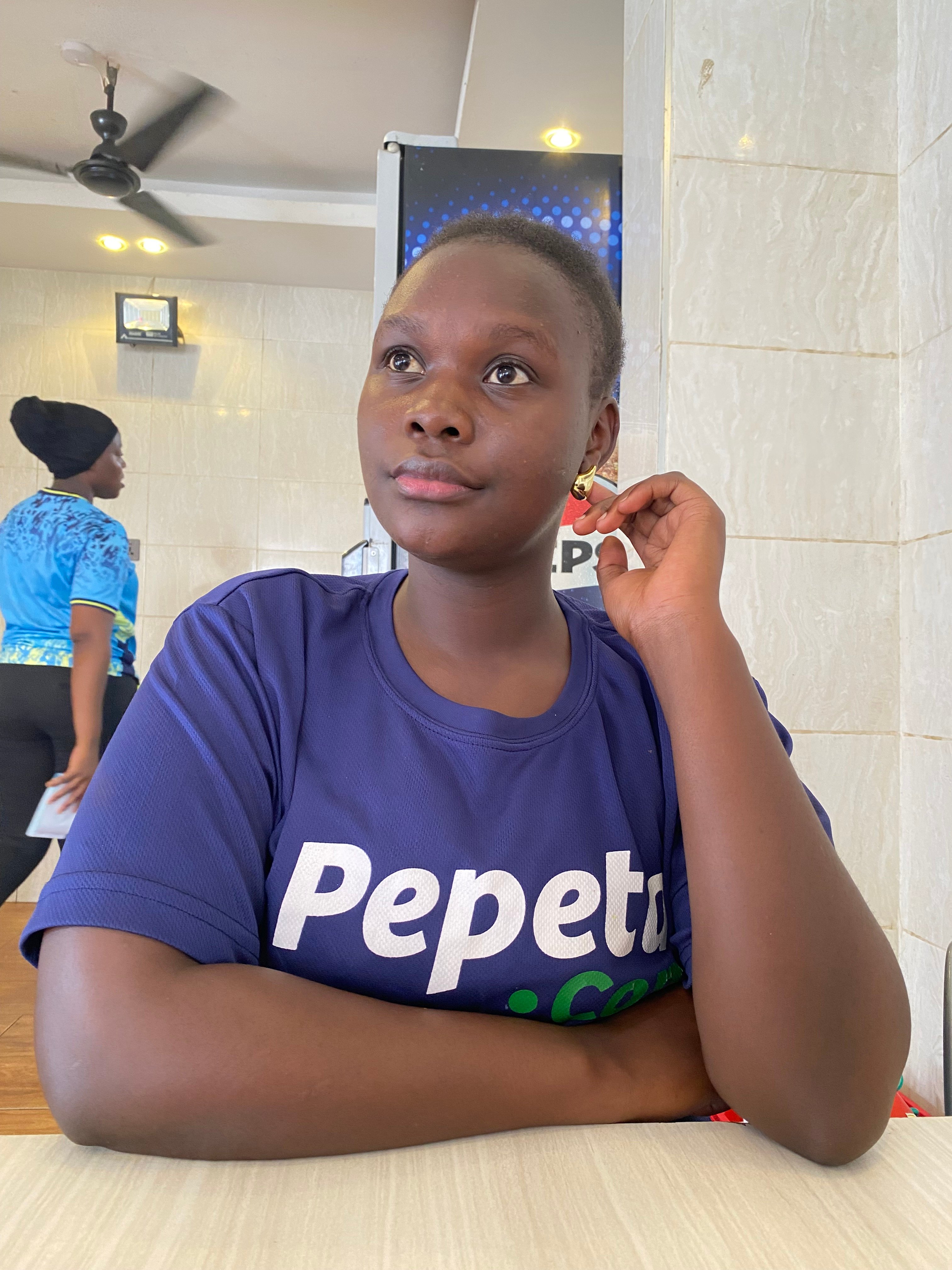 Profile photo for Whitney Nasimiyu
