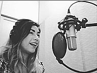 An engaging and dynamic female voice in Spanish for your projects Banner Image