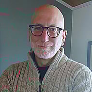A friendly and approachable middle-aged voice for your television ad Banner Image